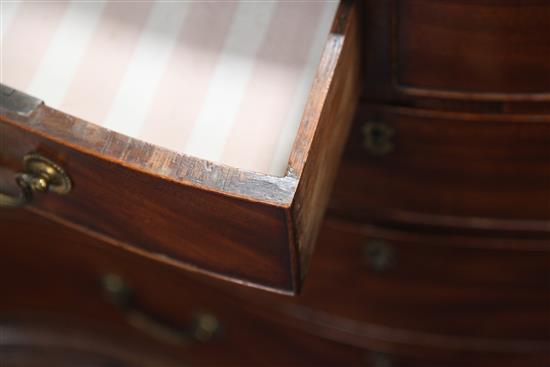 A George III serpentine mahogany chest, W.3ft 1in. D.1ft 9in. H.2ft 7in.